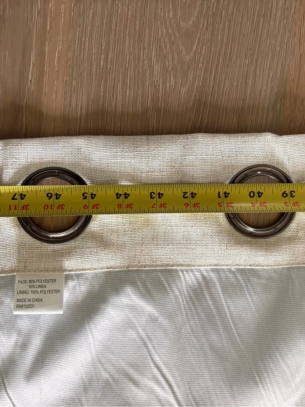 Pair of Tan & Cream Curtains w/ light blockout backing 48W by 83L.